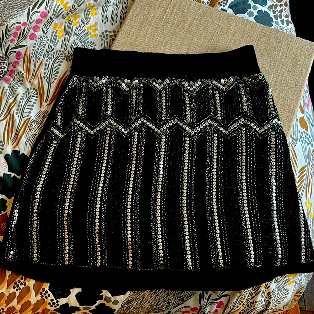 New never worn. Sequin and beaded mini skirt
